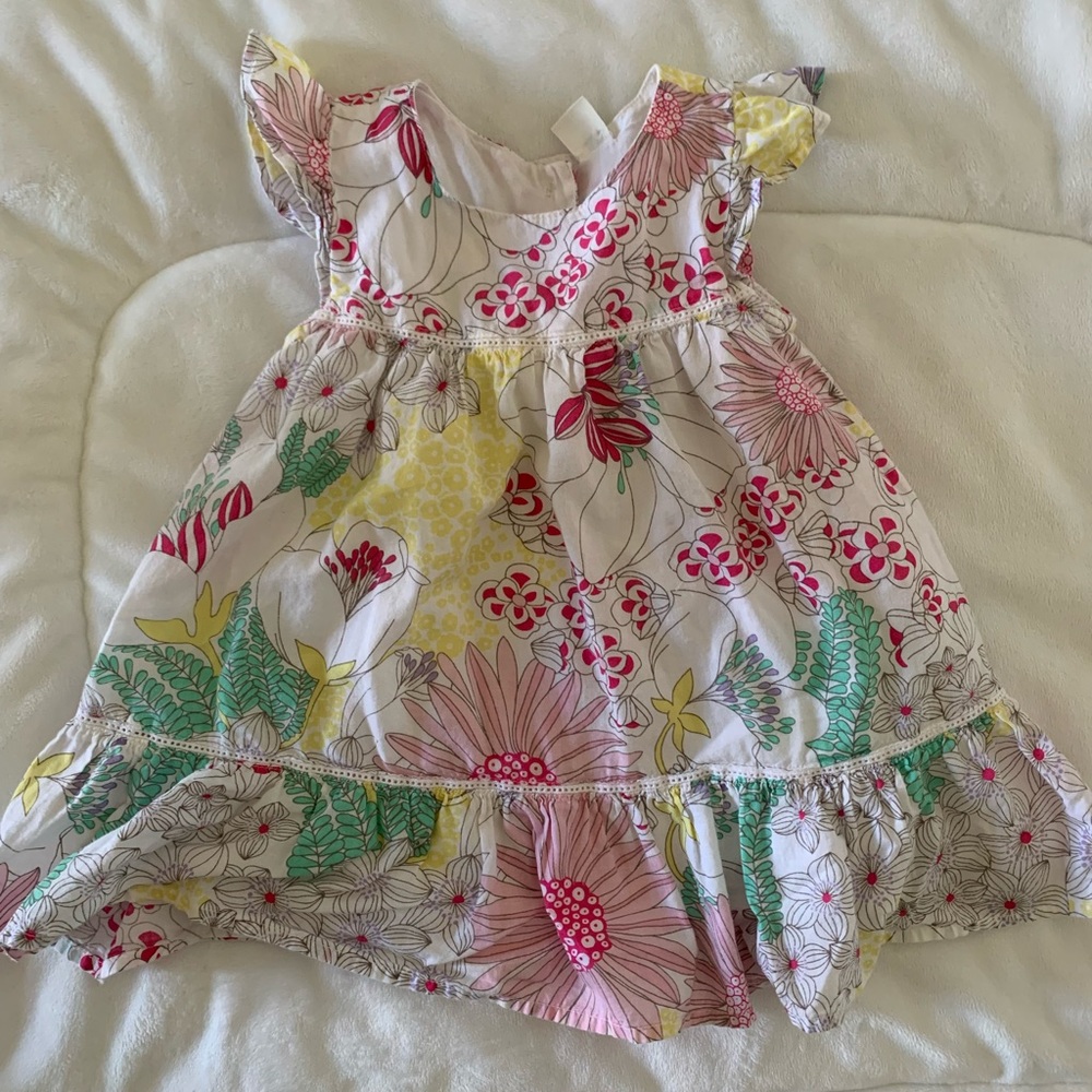 6-12 month old navy dress. Gorgeous. White and floral design.